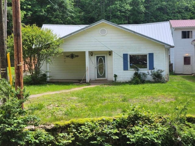 21544 Ky Route 122, Mcdowell, KY 41647 - view of front of house with a front yard and metal roof