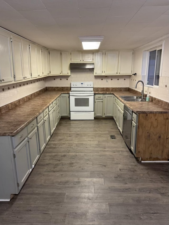 21544 Ky Route 122, Mcdowell, KY 41647 - kitchen with electric stove, under cabinet range hood, dishwasher, a sink, and dark countertops