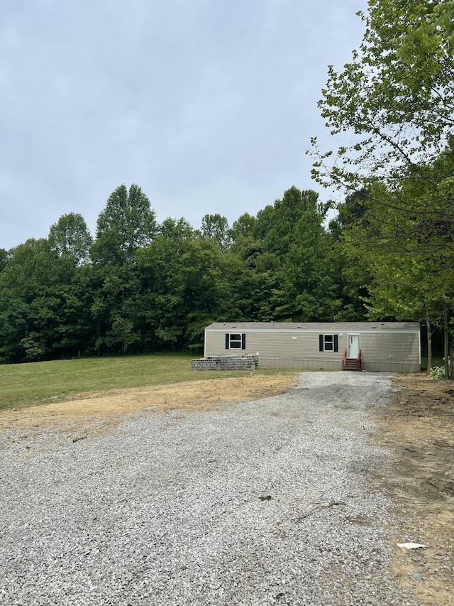 920 Barton Mill Cutoff Rd, Corbin, KY 40701 - view of outbuilding featuring gravel driveway and a view of trees