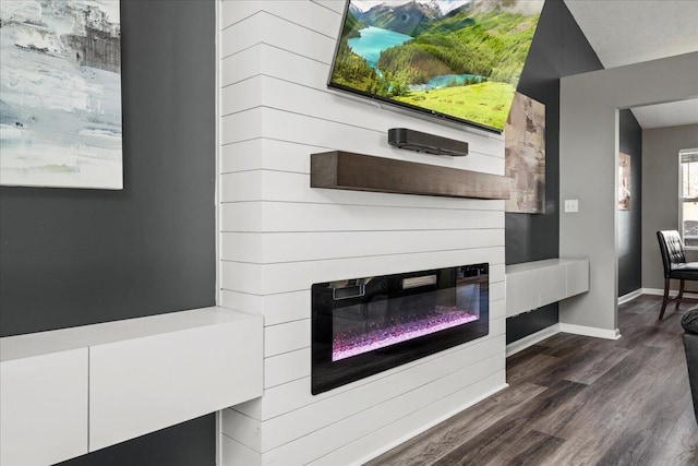 253 Gateway Park Cir, Lexington, KY 40511 - detailed view of wood finished floors, a glass covered fireplace, and baseboards