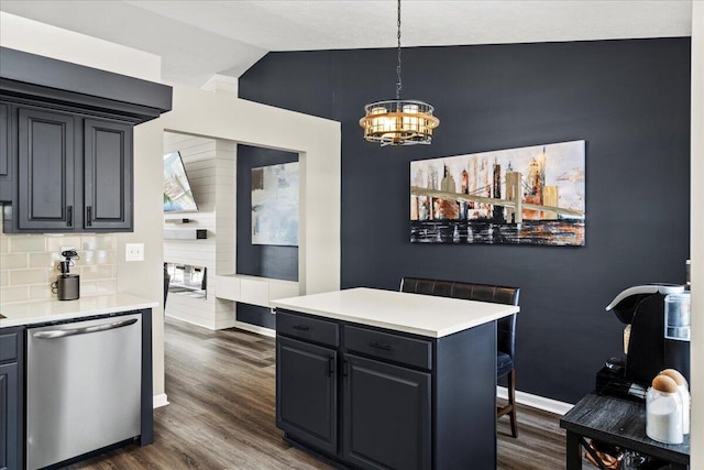 253 Gateway Park Cir, Lexington, KY 40511 - kitchen with stainless steel dishwasher, lofted ceiling, a chandelier, dark wood-type flooring, and baseboards