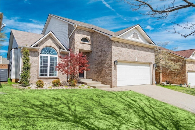 253 Gateway Park Cir, Lexington, KY 40511 - view of front of property with concrete driveway, a front yard, brick siding, and an attached garage