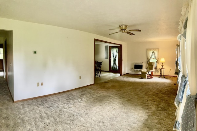 1184 Snow Creek Rd, Clay City, KY 40312 - unfurnished living room featuring carpet flooring, ceiling fan, heating unit, baseboards, and electric panel