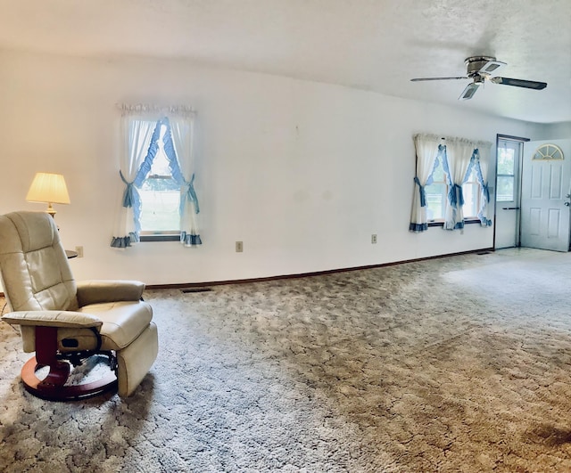 1184 Snow Creek Rd, Clay City, KY 40312 - living area featuring carpet floors, ceiling fan, and baseboards