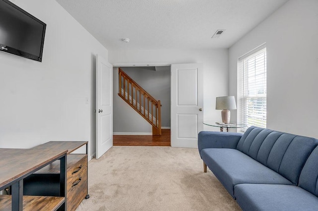 2433 Aristocracy Cir, Lexington, KY 40509 - living area featuring light carpet and stairway