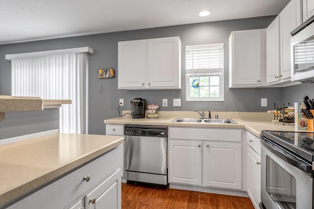 2433 Aristocracy Cir, Lexington, KY 40509 - kitchen featuring appliances with stainless steel finishes, a sink, recessed lighting, white cabinets, and light countertops