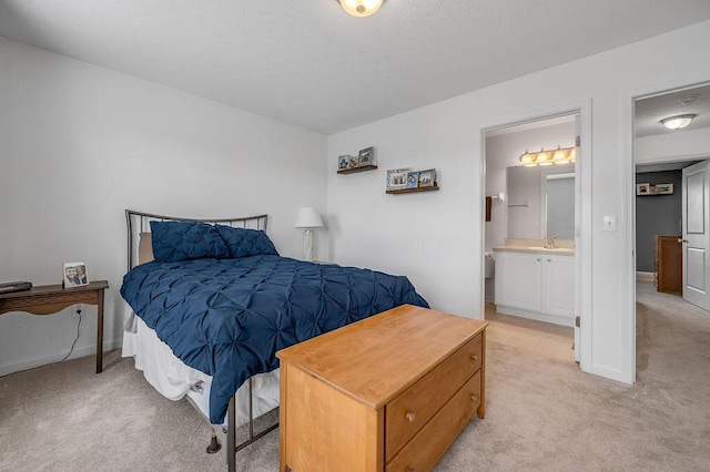 2433 Aristocracy Cir, Lexington, KY 40509 - bedroom featuring light colored carpet, a sink, and connected bathroom