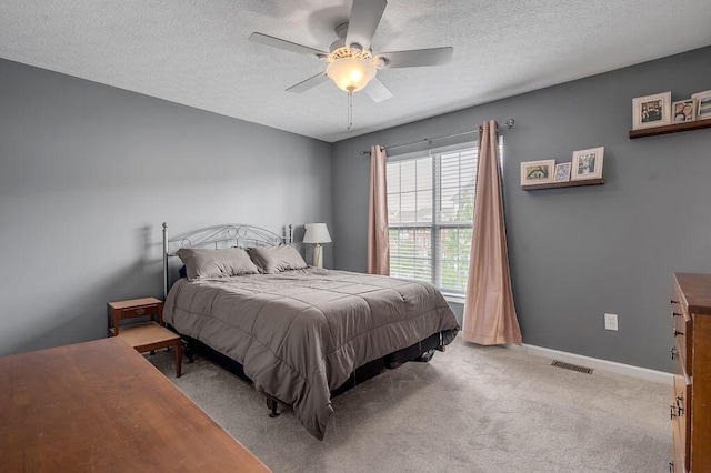 2433 Aristocracy Cir, Lexington, KY 40509 - bedroom featuring a textured ceiling, carpet floors, baseboards, and a ceiling fan