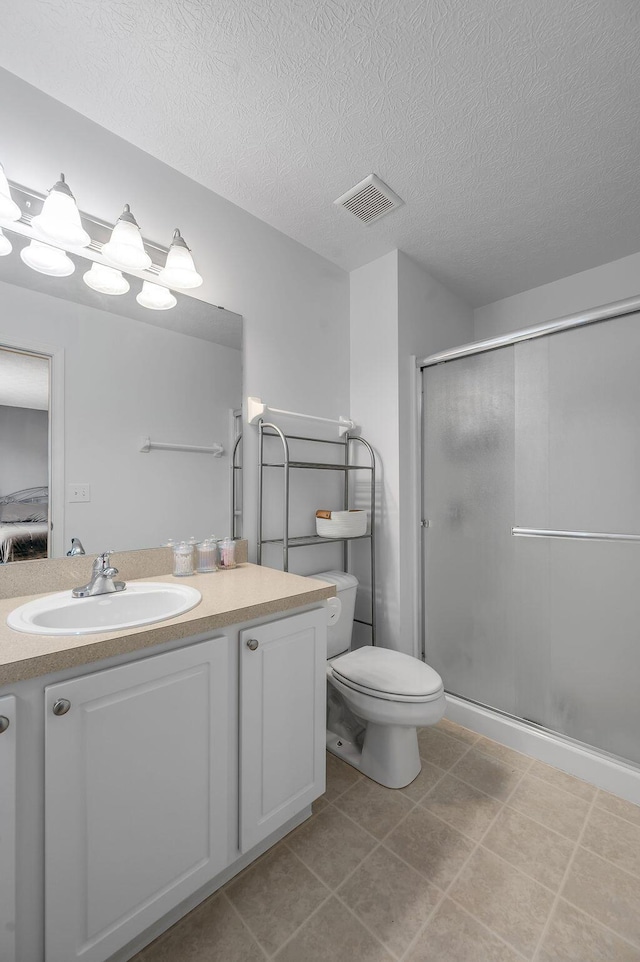 2433 Aristocracy Cir, Lexington, KY 40509 - bathroom featuring vanity, a shower stall, toilet, and a textured ceiling