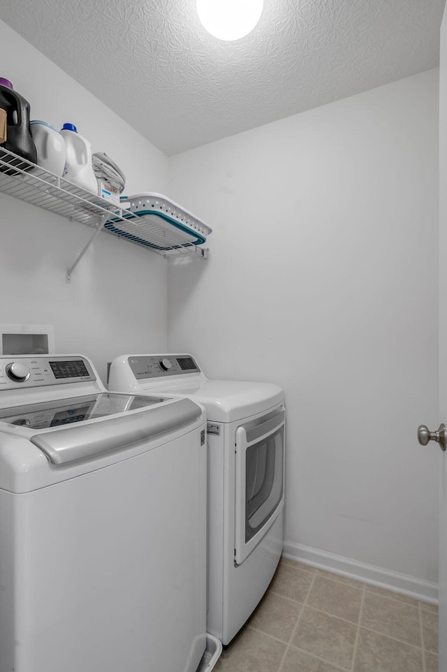 2433 Aristocracy Cir, Lexington, KY 40509 - washroom featuring independent washer and dryer, a textured ceiling, and baseboards