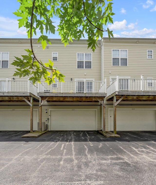 2433 Aristocracy Cir, Lexington, KY 40509 - rear view of property with an attached garage