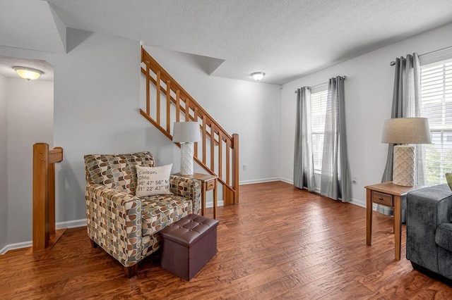 2433 Aristocracy Cir, Lexington, KY 40509 - sitting room with wood finished floors, plenty of natural light, baseboards, and a textured ceiling