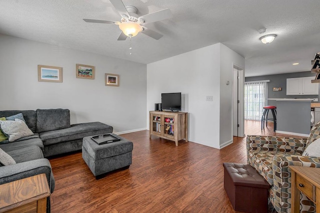 2433 Aristocracy Cir, Lexington, KY 40509 - living area featuring dark wood-style floors, a textured ceiling, baseboards, and ceiling fan