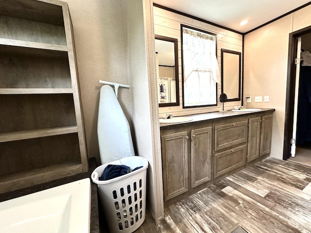 1126 College Hill Rd, Waco, KY 40385 - full bathroom with double vanity, wood finished floors, and a soaking tub