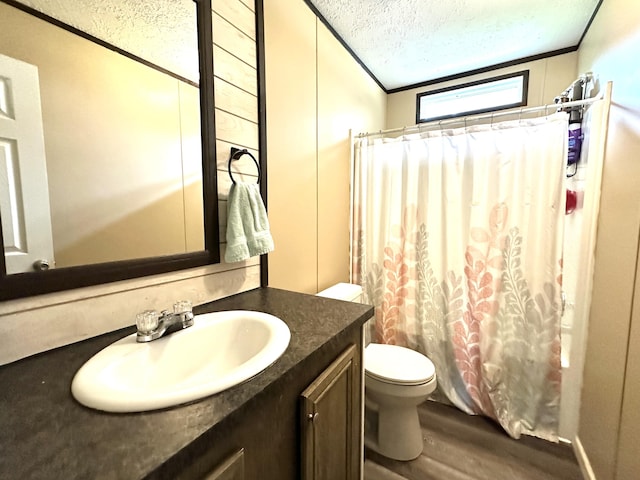 1126 College Hill Rd, Waco, KY 40385 - full bathroom with wood finished floors, vanity, a textured ceiling, toilet, and crown molding