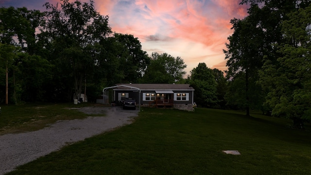 1126 College Hill Rd, Waco, KY 40385 - view of front facade featuring dirt driveway, a front yard, and a detached carport