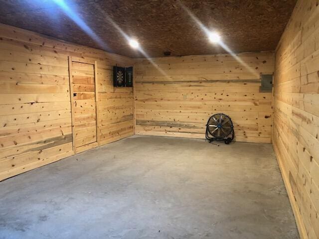 616 Zag Rd, West Liberty, KY 41472 - basement featuring wooden walls and electric panel