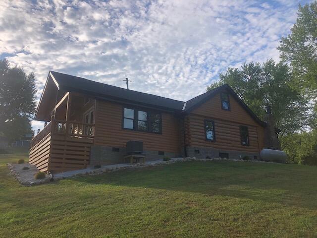 616 Zag Rd, West Liberty, KY 41472 - view of side of home with a yard