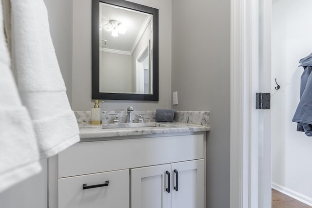 1025 Stowbridge Ln, Lexington, KY 40515 - bathroom with crown molding, vanity, and baseboards