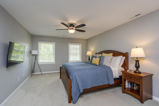 1025 Stowbridge Ln, Lexington, KY 40515 - bedroom with baseboards, light carpet, and ceiling fan