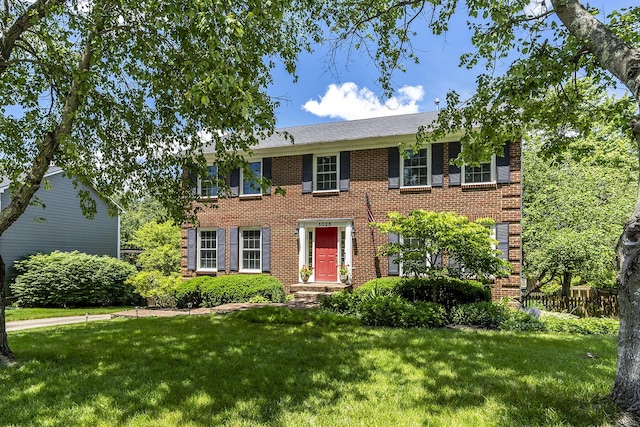 1025 Stowbridge Ln, Lexington, KY 40515 - colonial inspired home featuring a front lawn and brick siding