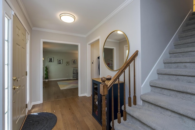 1025 Stowbridge Ln, Lexington, KY 40515 - foyer with wood finished floors, stairs, crown molding, and baseboards