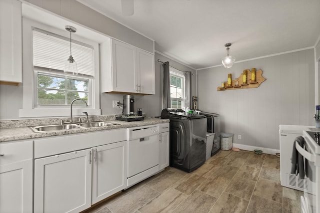 304 Hamilton Ave, Somerset, KY 42501 - kitchen featuring white dishwasher, a sink, separate washer and dryer, white cabinets, and baseboards