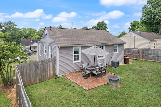 304 Hamilton Ave, Somerset, KY 42501 - rear view of house with a fire pit, roof with shingles, a patio, and central AC