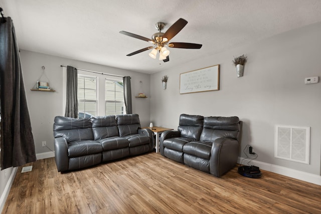304 Hamilton Ave, Somerset, KY 42501 - living area with ceiling fan, wood finished floors, and baseboards