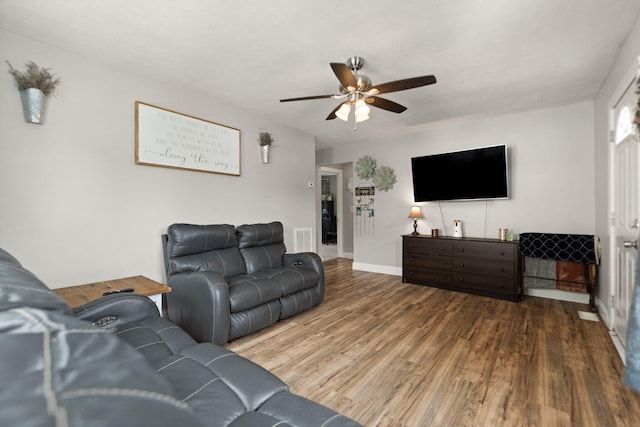 304 Hamilton Ave, Somerset, KY 42501 - living area featuring ceiling fan, wood finished floors, and baseboards