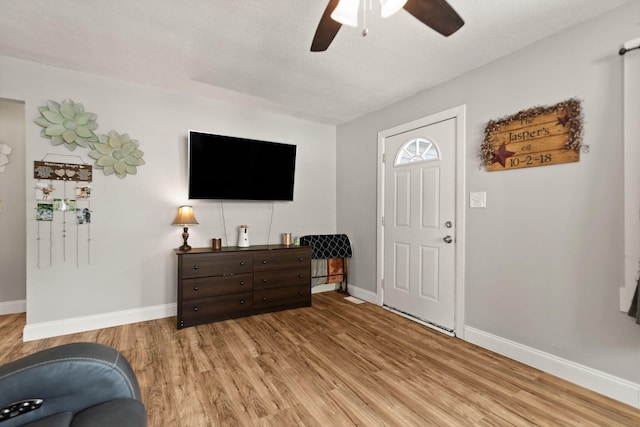 304 Hamilton Ave, Somerset, KY 42501 - entrance foyer featuring a ceiling fan, light wood-style floors, and baseboards