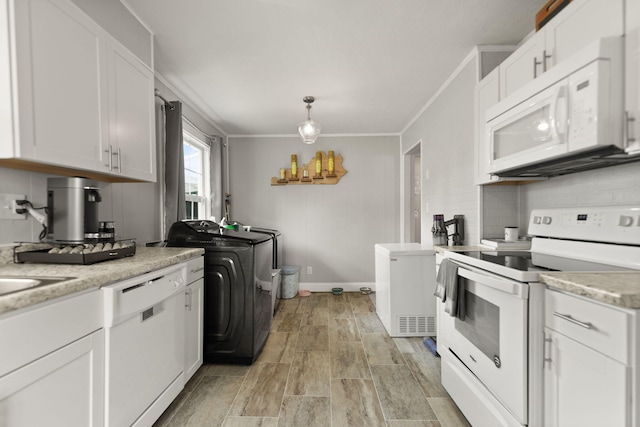 304 Hamilton Ave, Somerset, KY 42501 - kitchen featuring white appliances, ornamental molding, washer / clothes dryer, and white cabinets