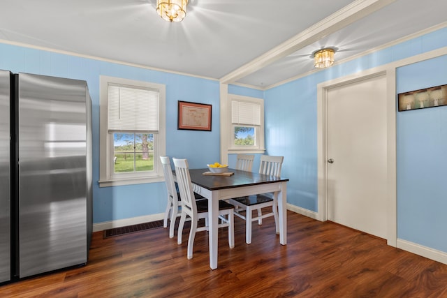 10165 Clifton Rd, Versailles, KY 40383 - dining space featuring ornamental molding, wood finished floors, and baseboards