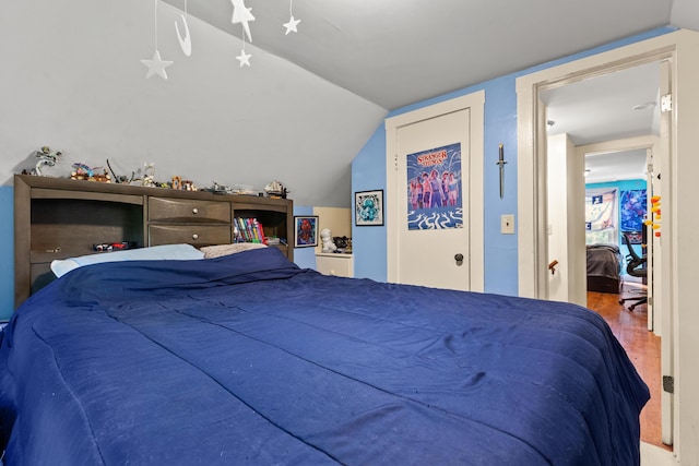 10165 Clifton Rd, Versailles, KY 40383 - bedroom featuring lofted ceiling and wood finished floors