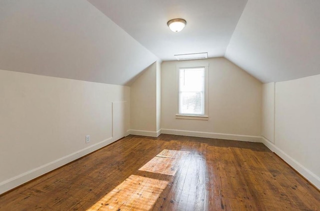 10165 Clifton Rd, Versailles, KY 40383 - bonus room featuring lofted ceiling, hardwood / wood-style flooring, and baseboards
