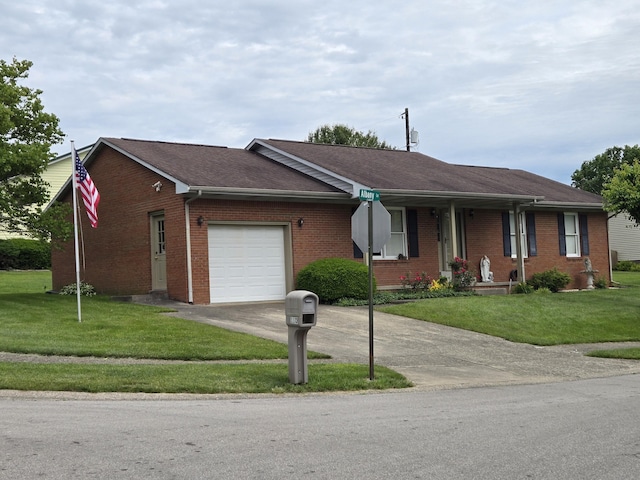 110 Albany Ln, Winchester, KY 40391 - ranch-style home featuring a garage, driveway, brick siding, and a front yard