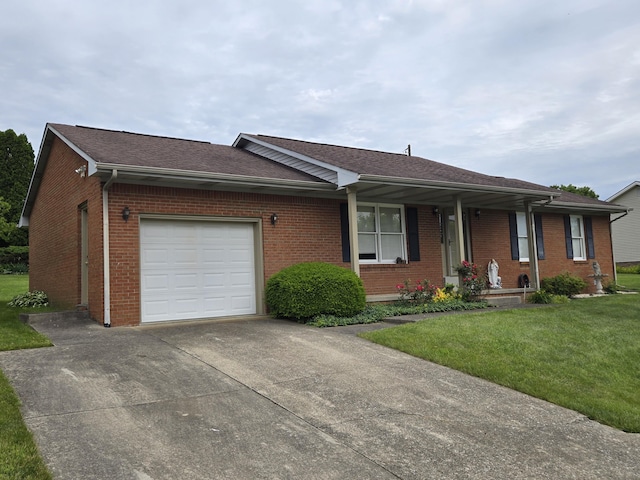 110 Albany Ln, Winchester, KY 40391 - ranch-style house with an attached garage, brick siding, a front lawn, concrete driveway, and roof with shingles