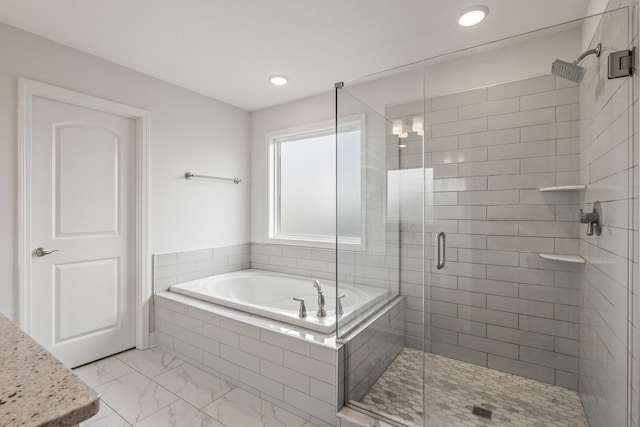 216 Blackthorn Dr, Nicholasville, KY 40356 - bathroom with a garden tub, marble look tiles, a shower stall, and recessed lighting