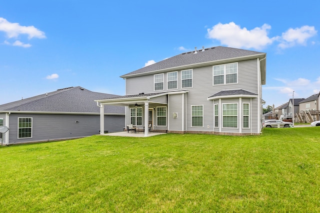 216 Blackthorn Dr, Nicholasville, KY 40356 - rear view of house featuring a patio, a ceiling fan, and a lawn