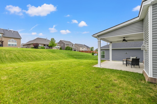 216 Blackthorn Dr, Nicholasville, KY 40356 - view of grassy yard with a ceiling fan, a patio area, and a residential view