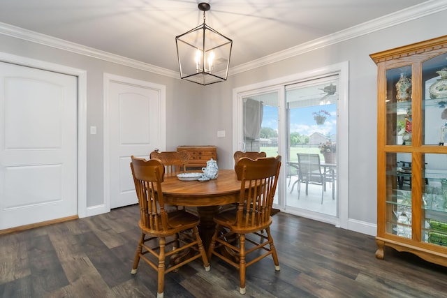 2002 Emerald Way, Richmond, KY 40475 - dining area featuring dark wood-type flooring, a chandelier, crown molding, and baseboards