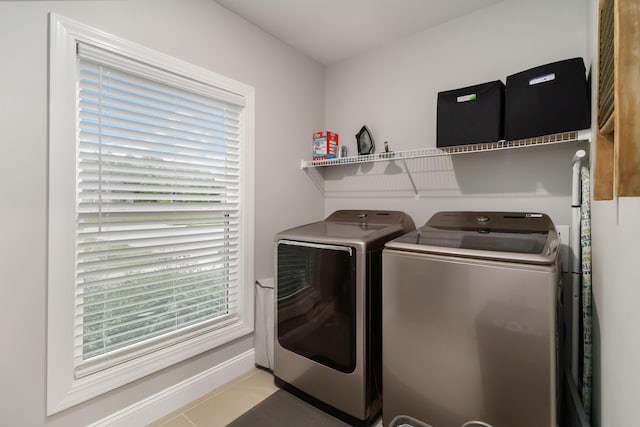 2002 Emerald Way, Richmond, KY 40475 - washroom featuring separate washer and dryer, light tile patterned floors, and baseboards