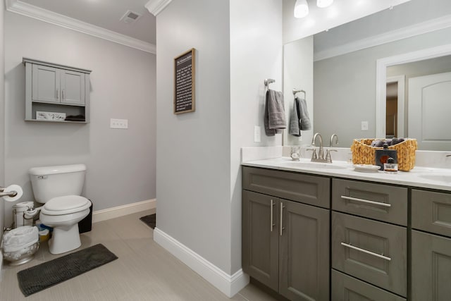 2002 Emerald Way, Richmond, KY 40475 - bathroom with toilet, double vanity, ornamental molding, and baseboards