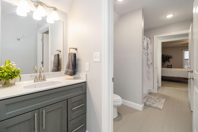 2002 Emerald Way, Richmond, KY 40475 - ensuite bathroom with vanity, toilet, recessed lighting, tile patterned floors, and baseboards