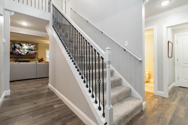 2002 Emerald Way, Richmond, KY 40475 - stairs with crown molding, wood finished floors, baseboards, and recessed lighting
