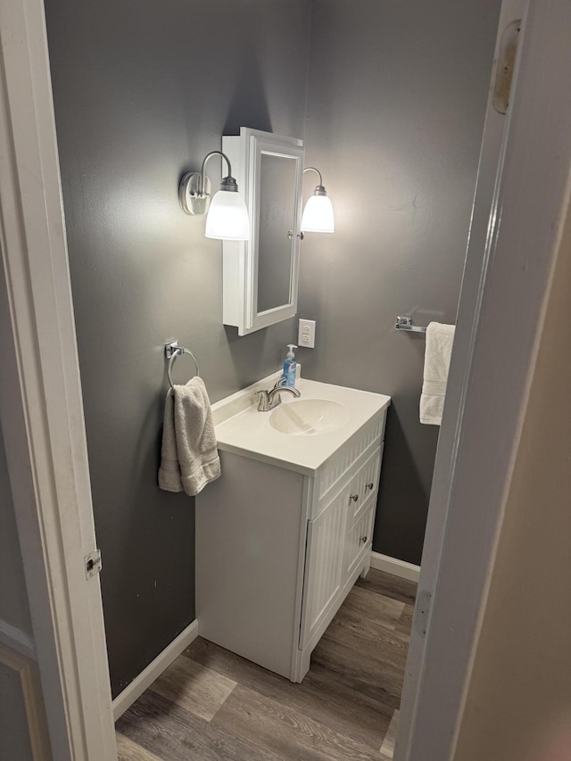 524 Cromwell Way, Lexington, KY 40503 - bathroom featuring wood finished floors, vanity, and baseboards
