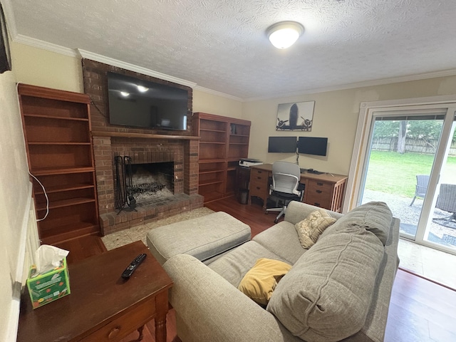 524 Cromwell Way, Lexington, KY 40503 - living room with a brick fireplace, wood finished floors, a textured ceiling, and ornamental molding