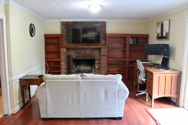 524 Cromwell Way, Lexington, KY 40503 - living room featuring wood finished floors, a desk, a fireplace, crown molding, and a wainscoted wall