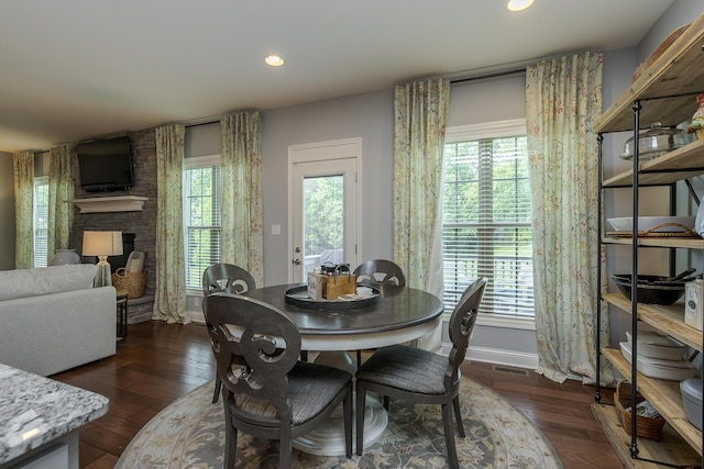 320 Manitoba Ln, Lexington, KY 40515 - dining room featuring dark wood finished floors, a brick fireplace, recessed lighting, and baseboards
