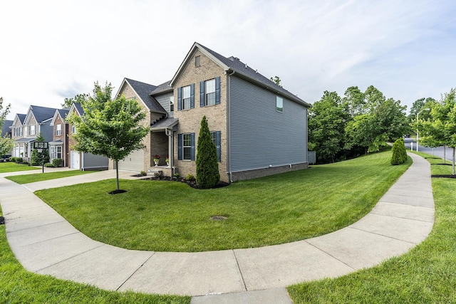 320 Manitoba Ln, Lexington, KY 40515 - view of side of property featuring a yard, concrete driveway, and a garage